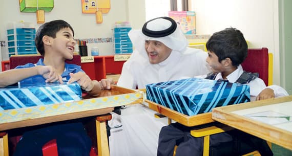 ..وهنا خلال زيارته لمركز الملك فهد لرعاية الأطفال المعوقين في الرياض.