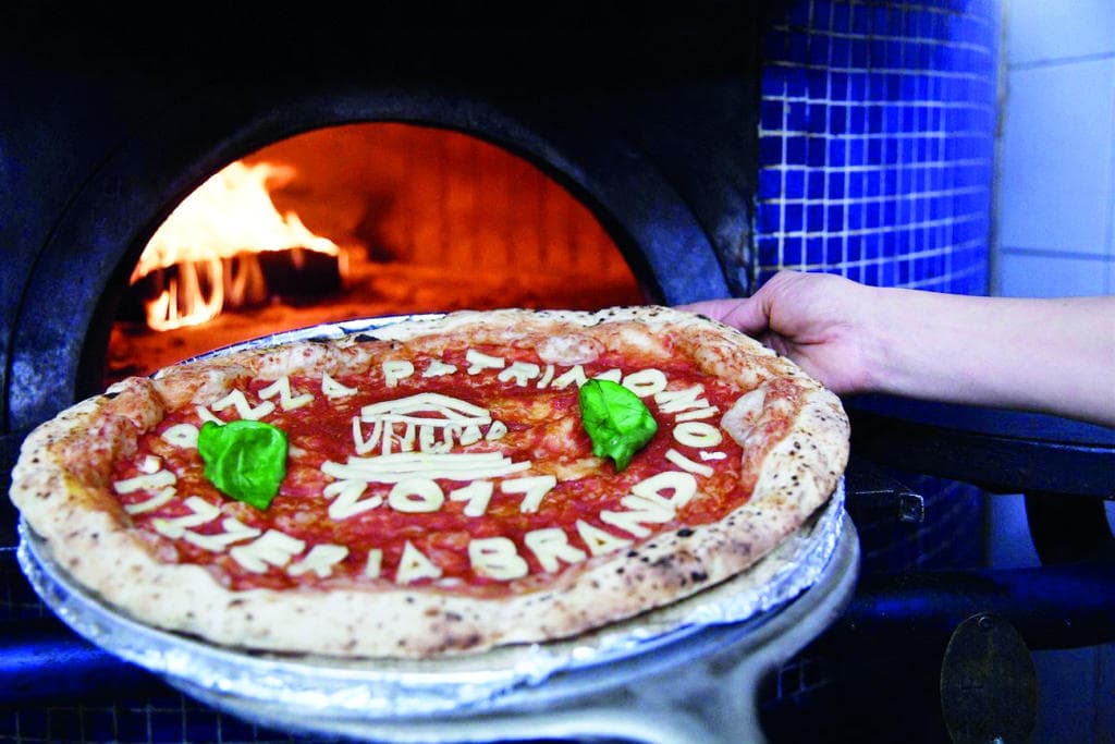 قائمة «يونسكو» للتراث العالمي .. لماذا غابت «الكبسة» وحضرت «البيتزا»؟