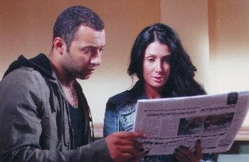 الممثلة غادة عبدالرزاق والمغني أحمد فهمي في لقطة من فيلم (أزمة شرف) تأليف طارق بركات (د ب أ)