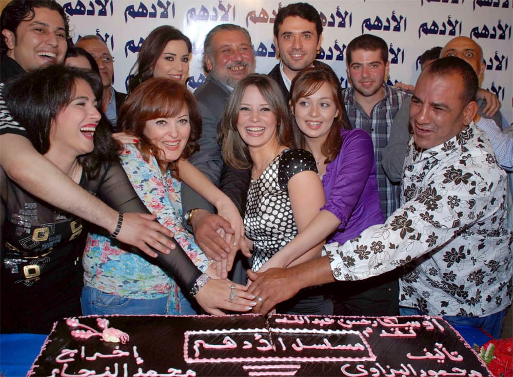 ممثلي "الأدهم" أثناء احتفاليه إطلاق المسلسل الجديد في القاهرة.