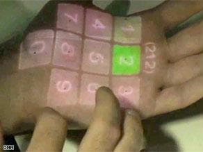 تطوير نظام يحول يد الشخص وساعده إلى لوحة مفاتيح وشاشة