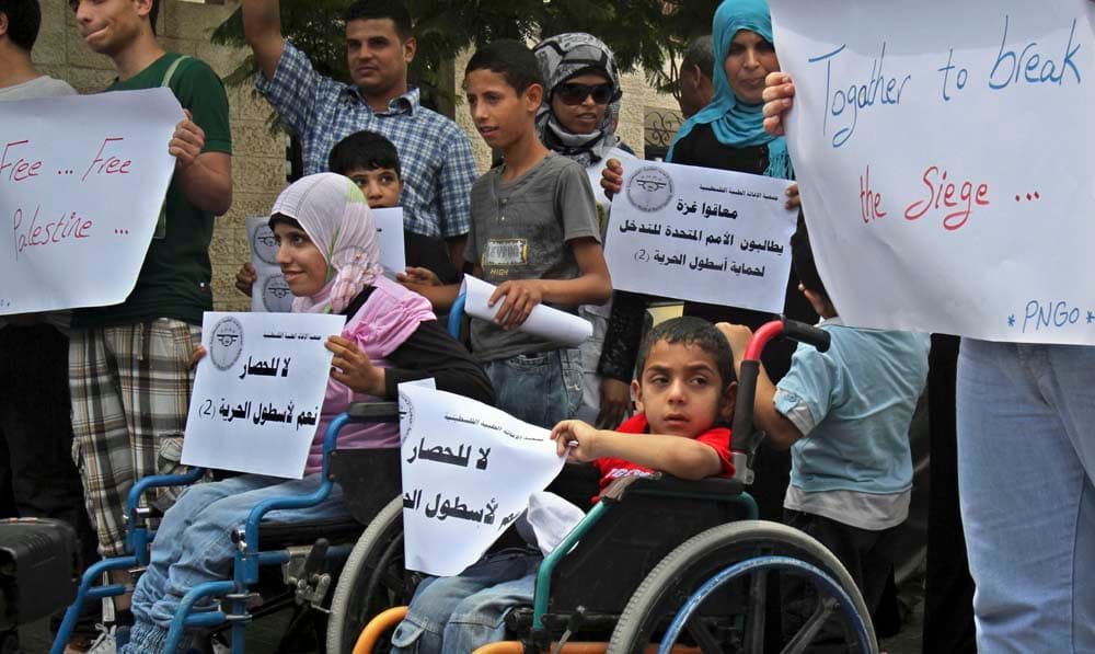 معاقوا غزة يطالبون  الأمم المتحدة للتدخل لحماية أسطول الحرية"2"