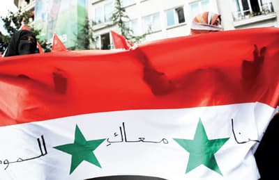 الأسد يرد على الضغوط الدولية بمذبحة جديدة في حمص ودير الزور