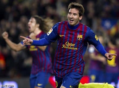 ميسي وفابريجاس يقودان برشلونة لتخطي اوساسونا في كأس اسبانيا