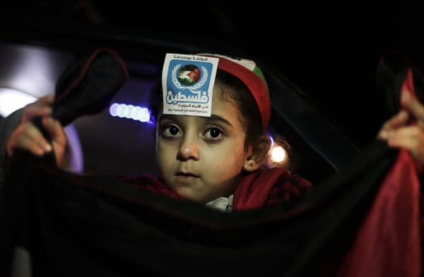 قصة مصورة: الفلسطينيون يحتفلون  بفوزهم باعتراف ضمني بدولة ذات سيادة في الامم المتحدة