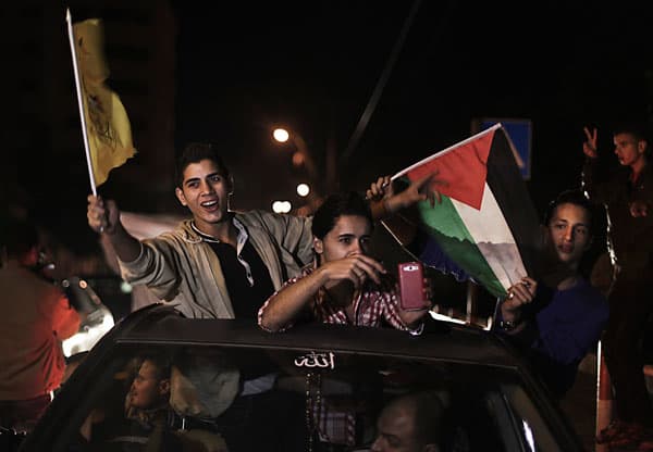 قصة مصورة: الفلسطينيون يحتفلون  بفوزهم باعتراف ضمني بدولة ذات سيادة في الامم المتحدة