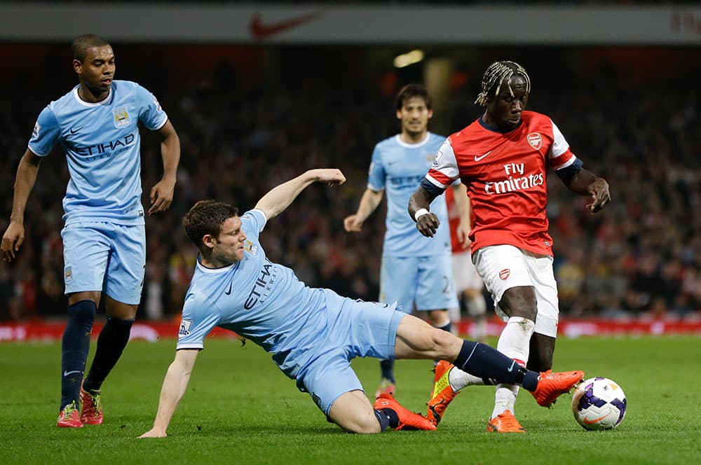 قصة مصورة:أرسنال ومانشستر يكتفيان بالتعادل في الدوري الانجليزي