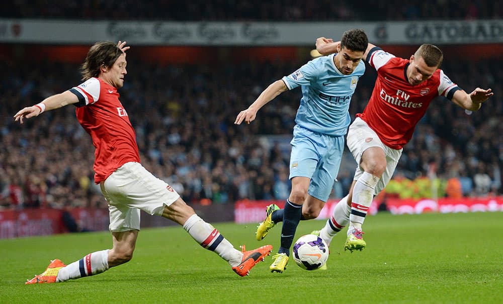 قصة مصورة:أرسنال ومانشستر يكتفيان بالتعادل في الدوري الانجليزي