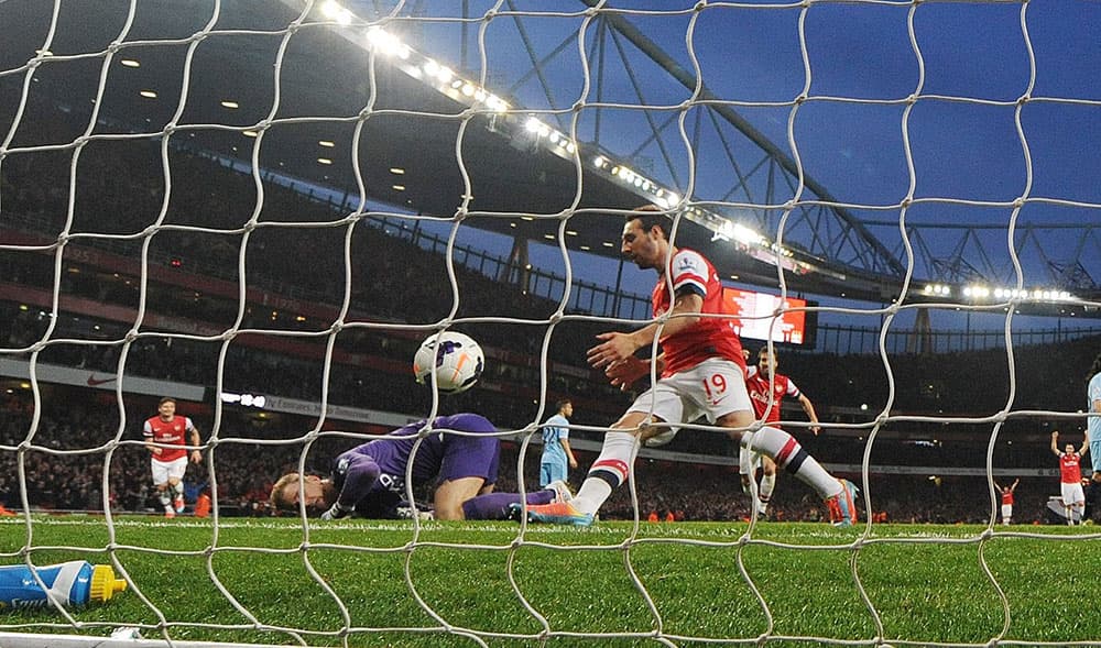 قصة مصورة:أرسنال ومانشستر يكتفيان بالتعادل في الدوري الانجليزي