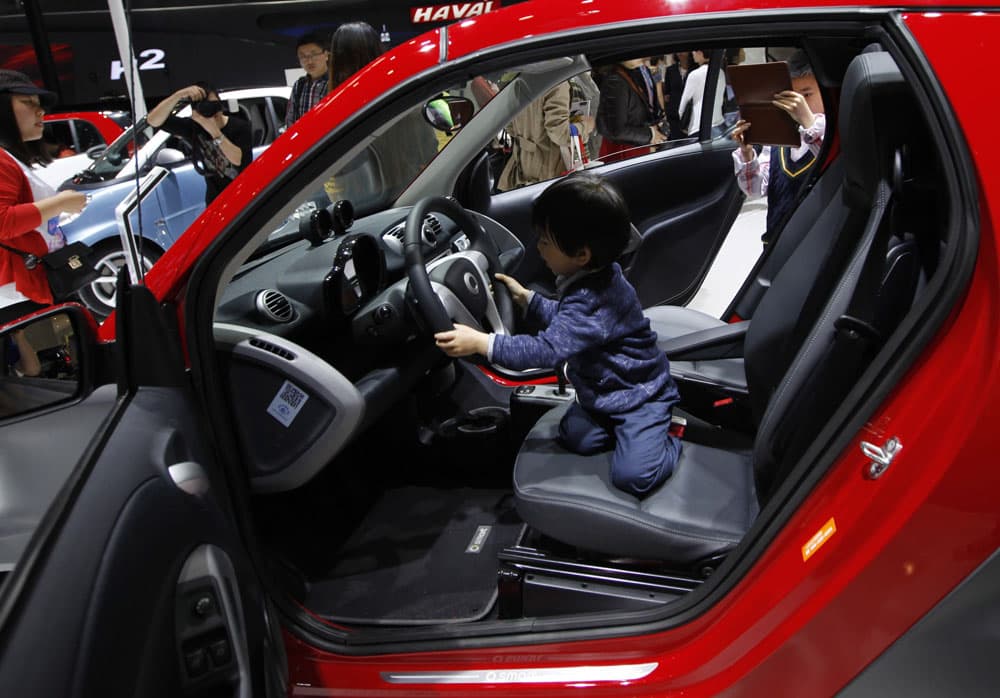 قصة مصورة : معرض بكين الدولي للسيارات