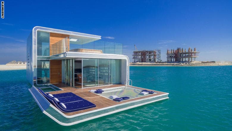 فيلات "فرس البحر" العائمة وقد استخدم المهندسون المعماريون ثلاثة عناصر رئيسية لبناء هيكل الفيلا الخارجي، أي اللدائن المدعمة بألياف زجاجية والفولاذ والأكريليك. وكان تثبيت الأكريليك بهيكل البناء تحدياً كبيراً، إذ تطلب الأمر استخدام مانع تسرب عالي المرونة وطويل الأمد، لا تنتجه إلا حوالي ثلاث شركات في العالم.