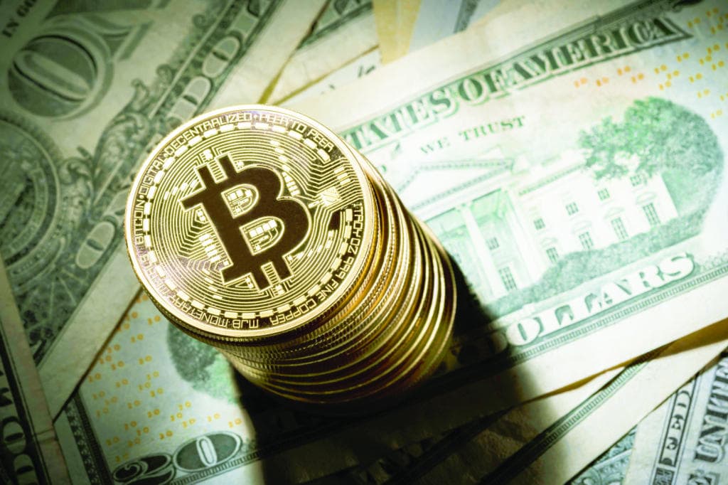 هل يطرد الـ «بيتكوين» الرقمي العملات الورقية من التداول؟