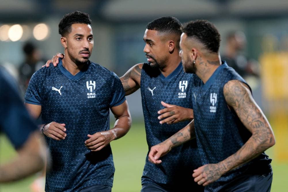 نيمار ومالكوم وسالم في تدريب الهلال. رويترز