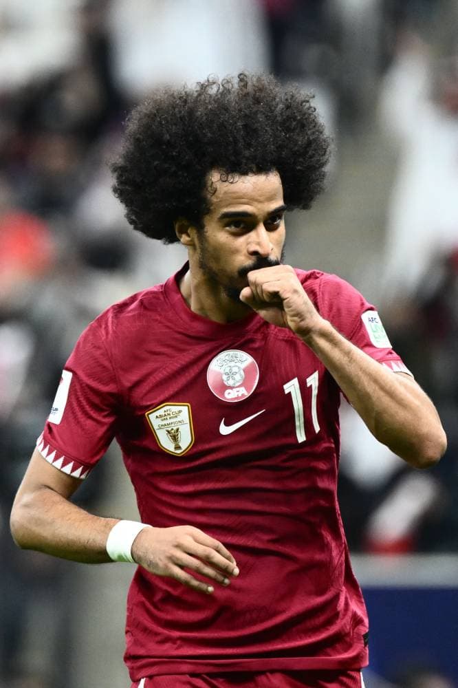 عفيف محتفلا بالهدف الأول لقطر. الفرنسية