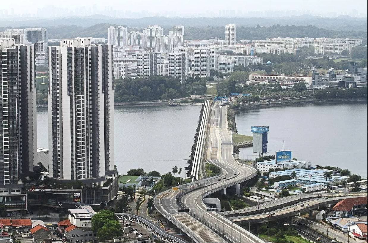 ماليزيا توقع على مشروع المنطقة الاقتصادية المشتركة مع سنغافورة في سبتمبر