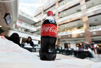 «كوكا كولا» تستحوذ على 50 % من «العوجان» بـ 4 مليارات ريال