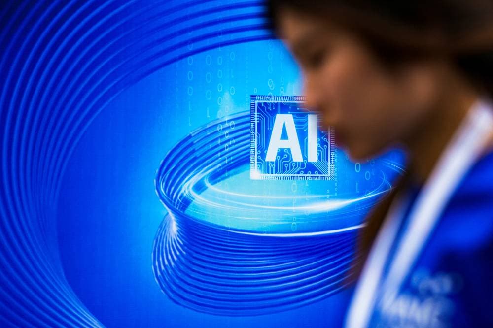 FILE PHOTO: An AI (Artificial Intelligence) sign is seen at the World Artificial Intelligence Conference (WAIC) in Shanghai, China July 6, 2023. REUTERS/Aly Song