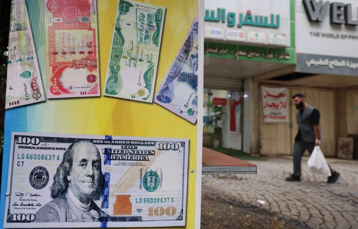 العراق يخفض سعر الدينار بنحو 15% وسط أزمة اقتصادية متفاقمة