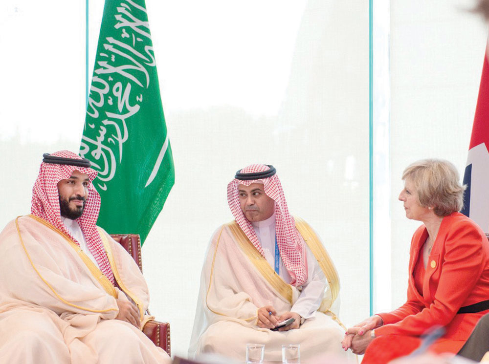 .. وخلال اجتماعه مع رئيسة وزراء بريطانيا.