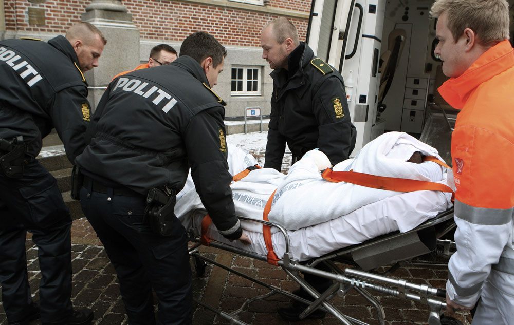 الدنمارك: توقيف صومالي بعد محاولته قتل رسام الكاريكاتير المسيء للرسول