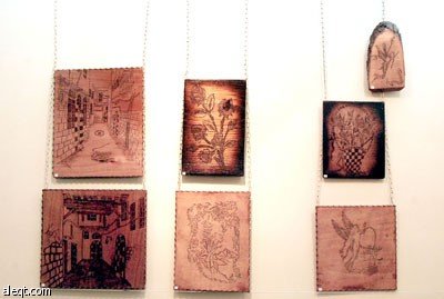 الإرادة تقود ذوي احتياجات خاصة سوريين لإقامة معرض تشكيلي