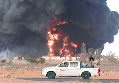 مخاوف من عودة القذافي إلى الإرهاب والتطرف العنيف في حالة انتصاره على الثوار