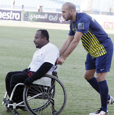 سباق المعوقين يشعل مدرجات التعاون والنصر