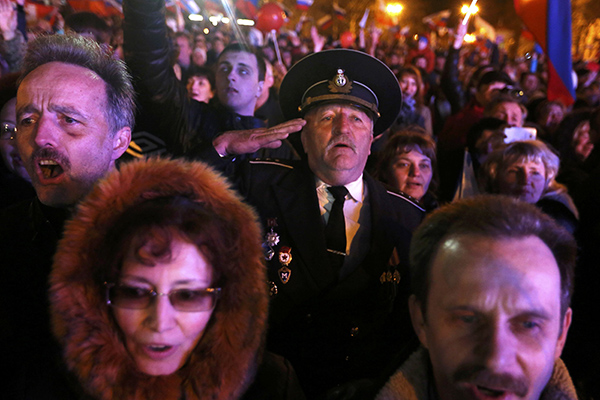 قصة مصورة : أوباما يفرض عقوبات على 11 روسيا وأوكرانيا بعد استفتاء القرم