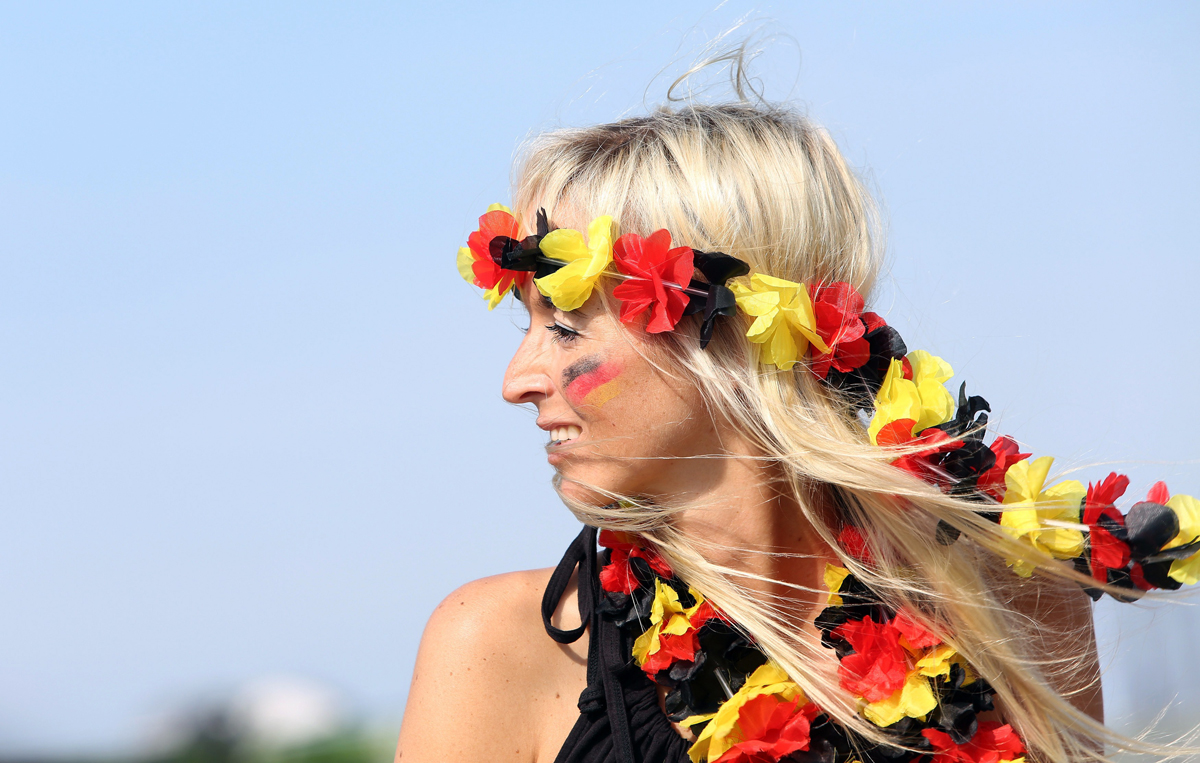 قصة مصورة : الالمان يحتشدون في برلين لاستقبال ابطال العالم