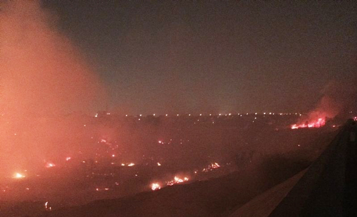 إخماد حريق كبير في وادي حنيفة