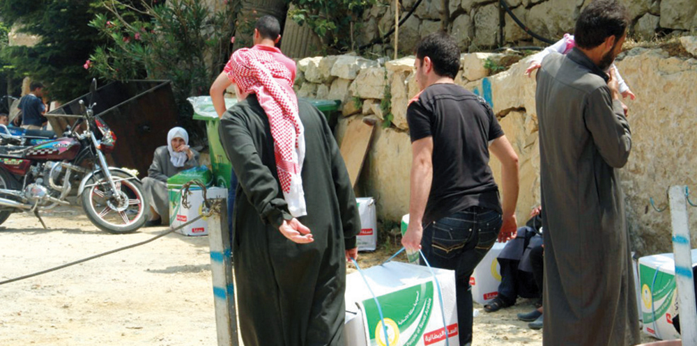 «نصرة الأشقاء» توزع سلالا رمضانية على 300 ألف نازح سوري