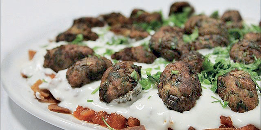 «الكبة» و«الترتة» على موائد الإفطار الجماعي للجالية التركية