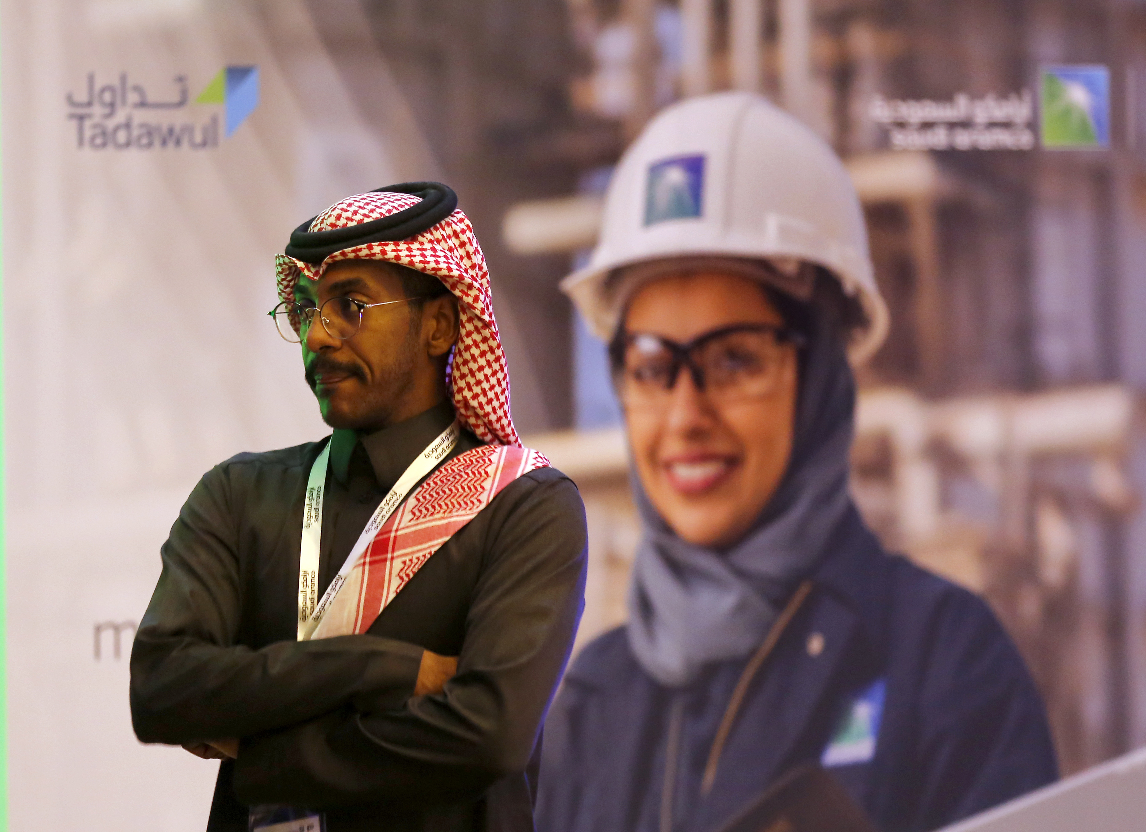 قصة مصورة : سهم أرامكو يرتفع بالنسبة القصوى في أول أيام إدراجه في السوق السعودية