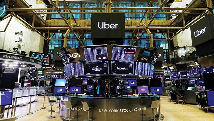 "وول ستريت" تتعافى بدعم من آمال التحفيز