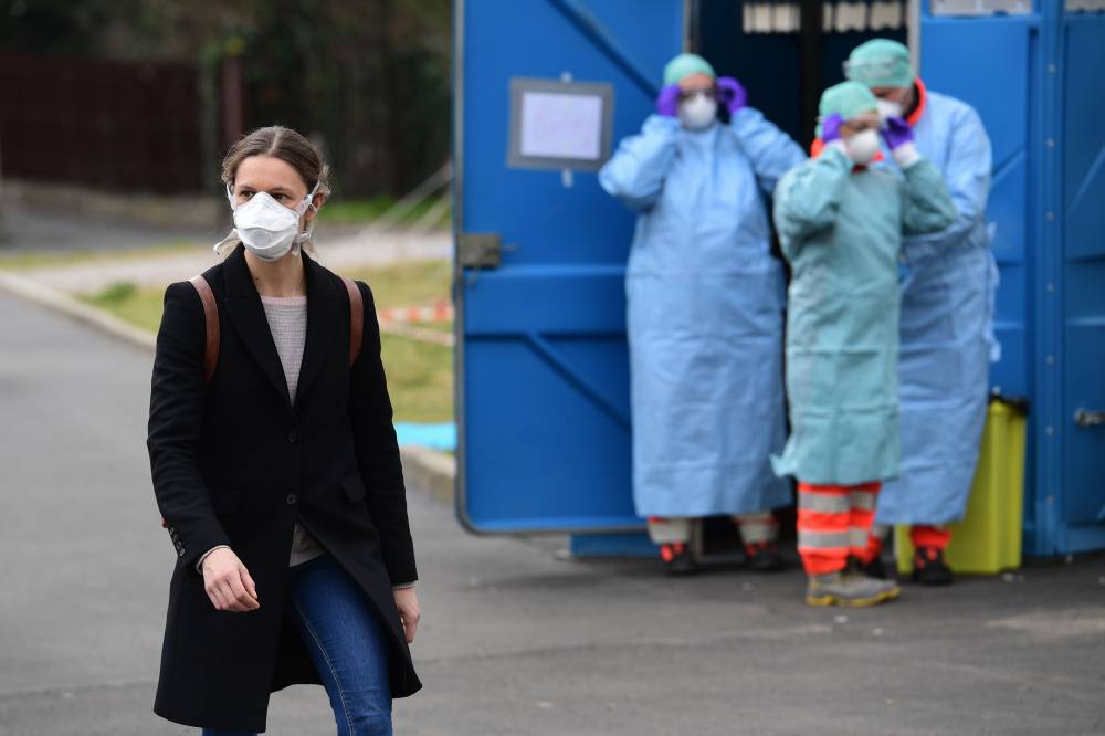 الإيطاليون في الصين بين بؤرتين لوباء كورونا