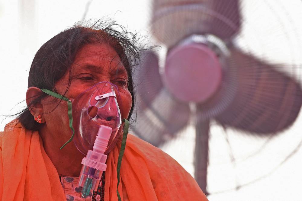 أنشئ شبان الهند تطبيقات لحشد المساعدات وتقديم الإمدادات. "الفرنسية"