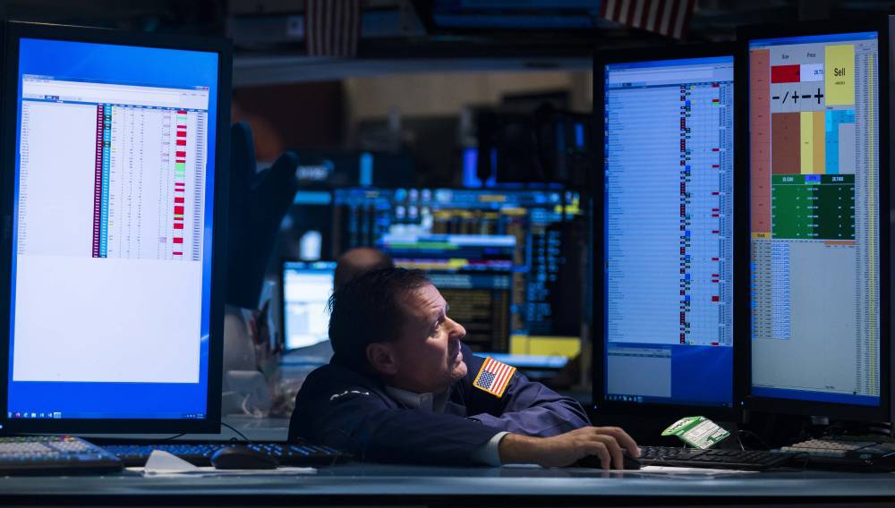 epa09950992 A trader works on the floor of the New York Stock Exchange in New York, New York, USA, 16 May 2022. Stocks were lower at the start of the trading day continuing weeks of losses.  EPA/JUSTIN LANE