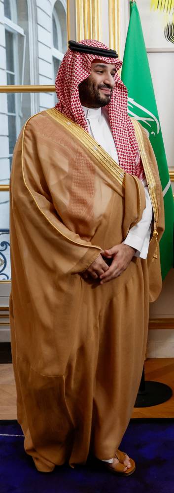 French President Emmanuel Macron meets with Saudi Crown Prince Mohammed bin Salman ahead of a working dinner at the Elysee Palace in Paris, France, July 28, 2022. REUTERS/Benoit Tessier