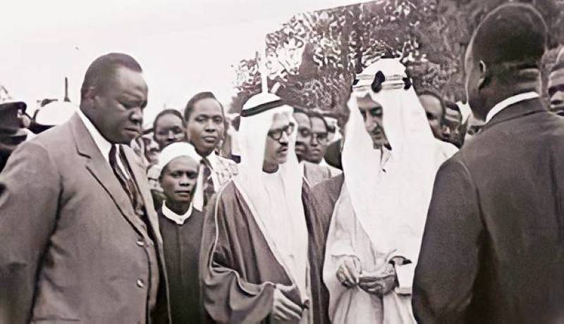 مرافقا للملك فيصل في إحدى زياراته الخارجية. 