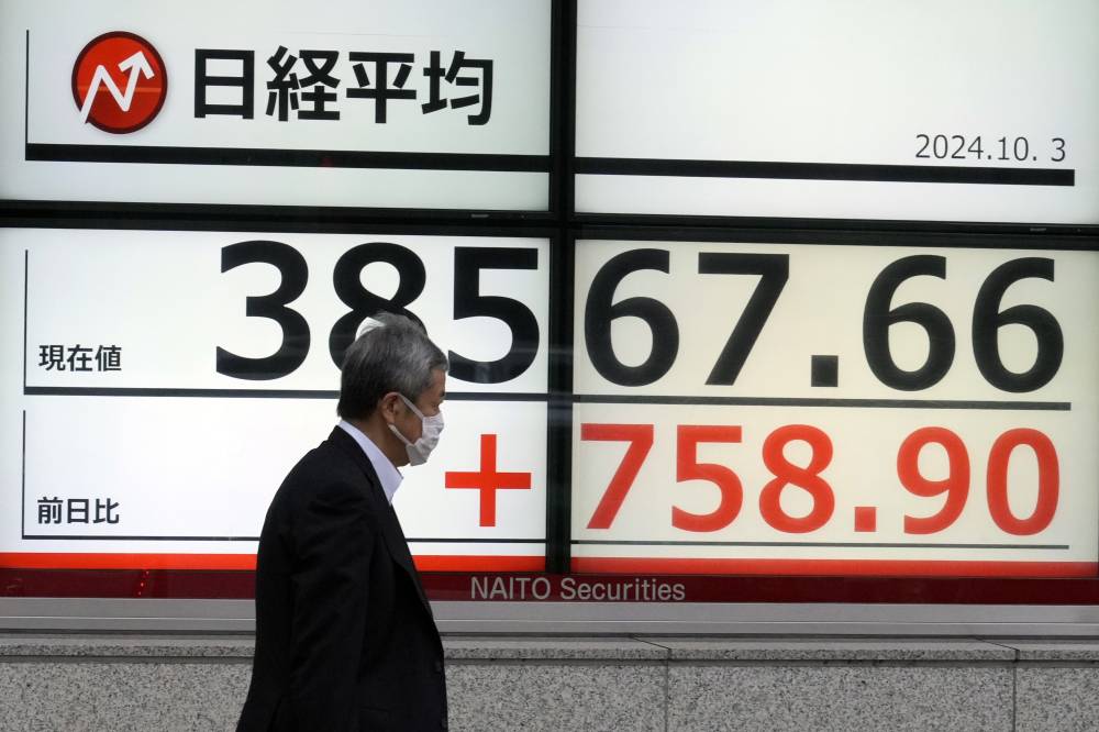 أغلق مؤشر نيكاي مرتفعا 1.97% عند 38552.06 نقطة. "أ.ب"