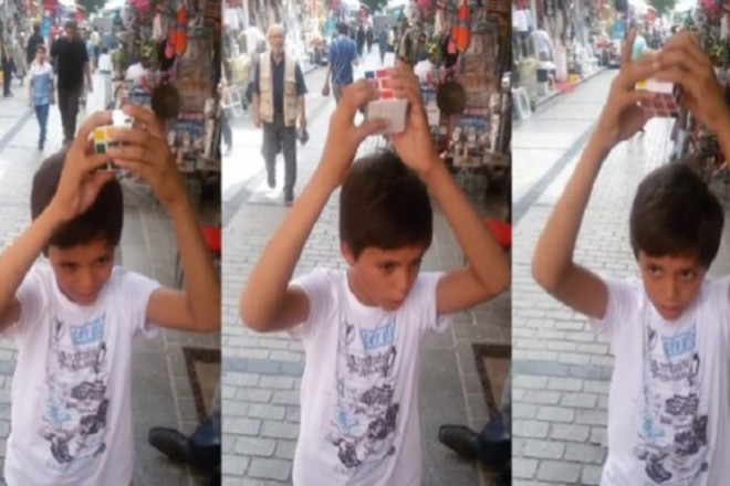 بالفيديو .. طفل سوري يحل لغز مكعب الذكاء "روبيك" بوقت قياسي دون أن ينظر إليه