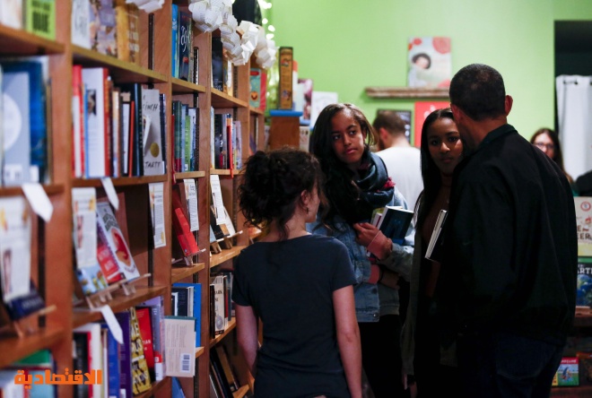 قصة مصورة: أوباما يتسوق بصحبة ابنتيه لدعم المشروعات الصغيرة