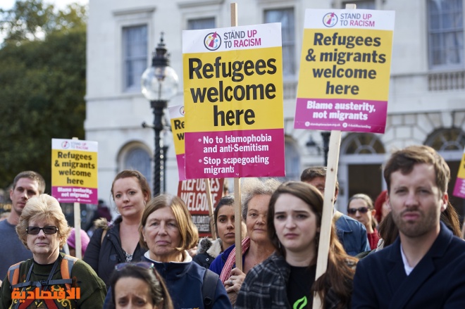 قصة مصورة: مئات البريطانيين يتضامنون مع اللاجئين
