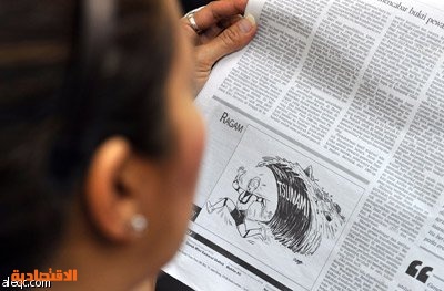 صحيفة ماليزية تعتذر عن رسم كارتوني حول تسونامي الذي ضرب اليابان