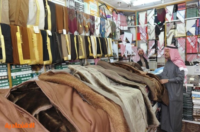فصل الشتاء ينعش حركة بيع الملابس الشتوية والتدفئة في  منطقة عسير