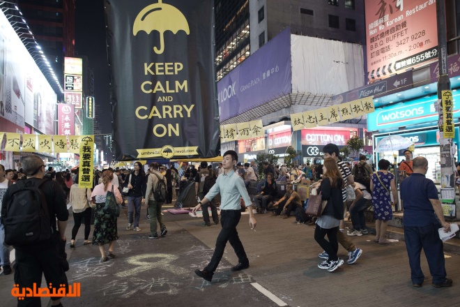 قصة مصورة : متظاهرون في هونج كونج يحتلون وسط المدينة