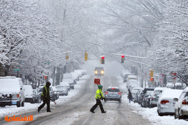 قصة مصورة : تساقط الثلوج على ولاية نيويورك الأمريكية