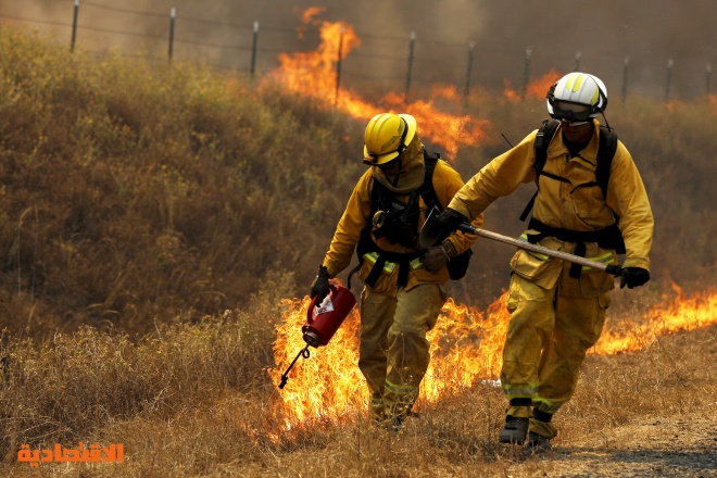 قصة مصورة: حريق هائل يحول غابات ولاية كاليفورنيا الأمريكية إلى رماد - فيديو