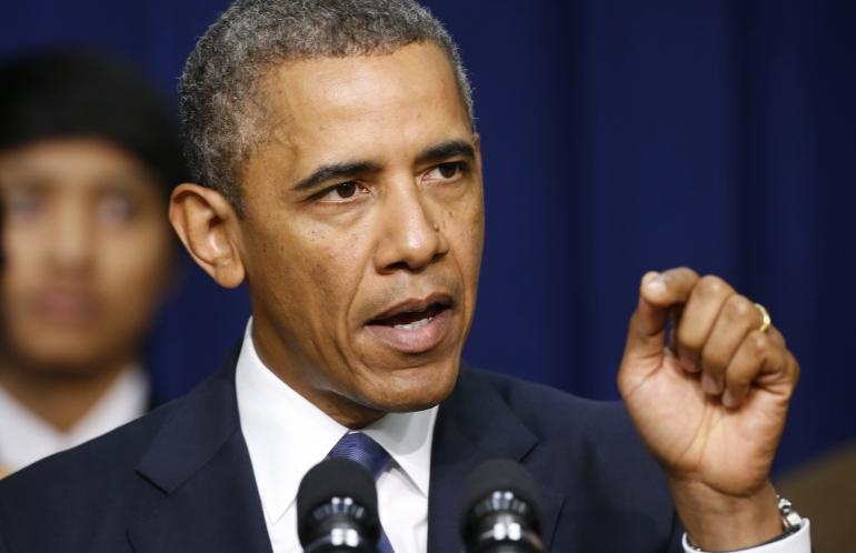 الرئيس الأمريكي باراك أوباما يقوم بزيارة مفاجئة لموقع هجمات باريس الإرهابية