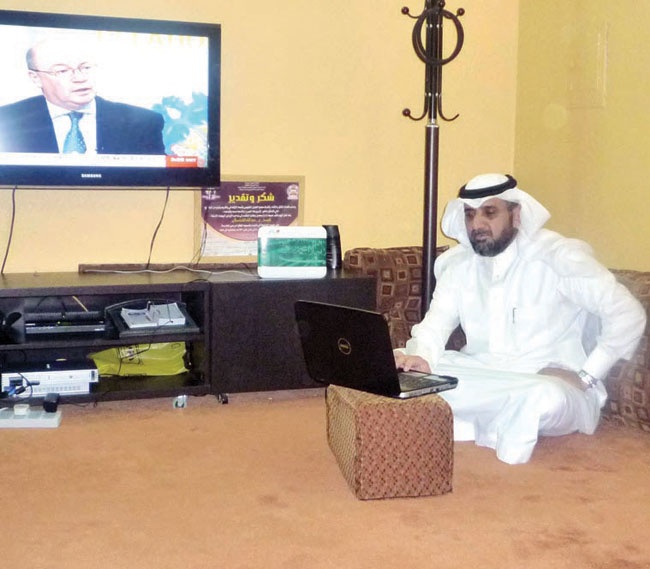 STC  تركب مودم الإنترنت متوشحاً بالعلم السعودي في منازل المواطنين